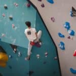 A man climbs on an indoor climbing wall in Cardiff at Flashpoint.
