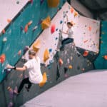 A couple of girls bouldering at Flashpoint Cardiff.
